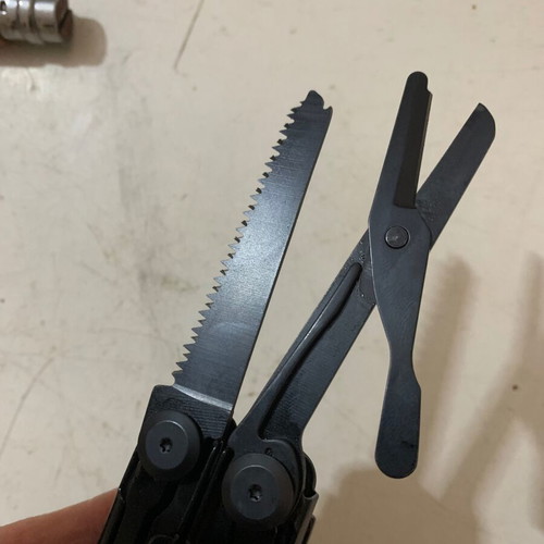 Staal multitool used with case and spare blades