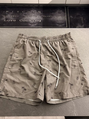 Shein khaki swim shorts small with black palm trees
