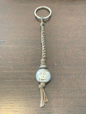 Babylonia silver keychain used, brown