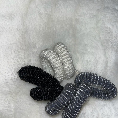 Set of hair elastics new, two black, gray and white