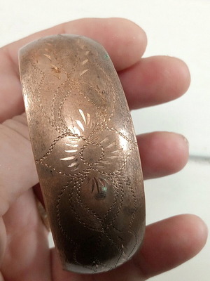 Copper bracelet with decorative engravings open size like new