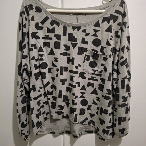 ALE long sleeve blouse with black print, like new