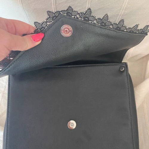 Black ladies handbag backpack like new with lace design and laptop pocket