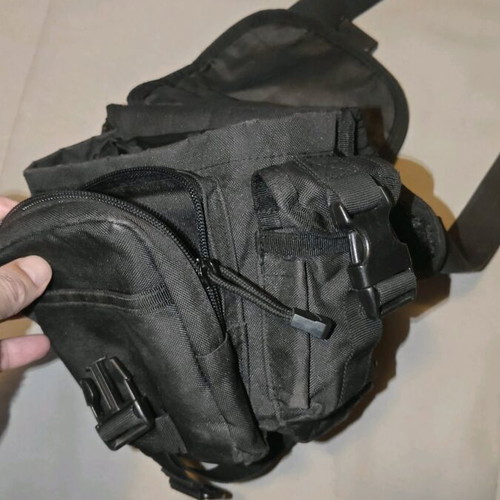 Thigh bag used with multiple compartments and phone pocket