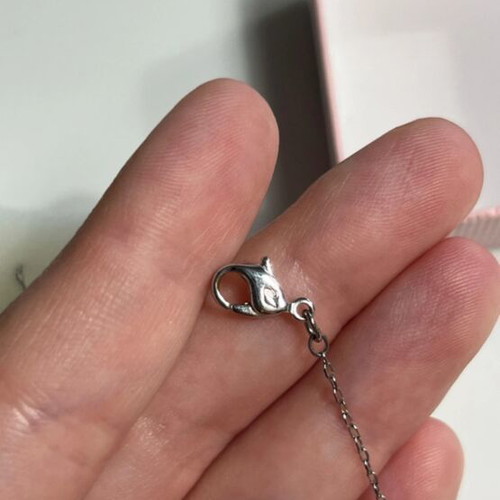 Swarovski 3D heart necklace used, gray and pink