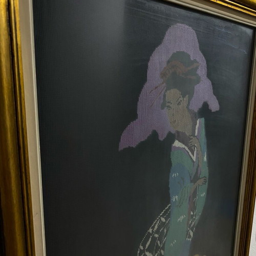 Textile painting with embroidered design used