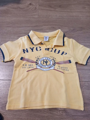 Μπλουζάκι τύπου polo New Kind σαν καινούργιο, κίτρινο, 2-3 ετών