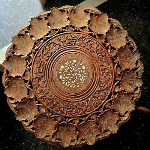 Carved coffee table used, 45cm height and 45cm diameter