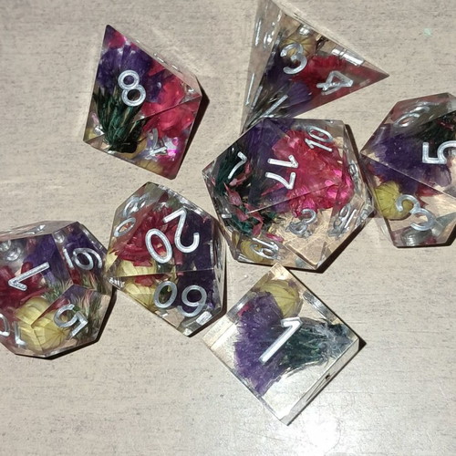 Summer meadow D&D dice set with colorful flowers inside