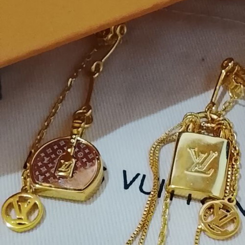 Louis Vuitton stainless steel earrings, rare sold out design, gold tone