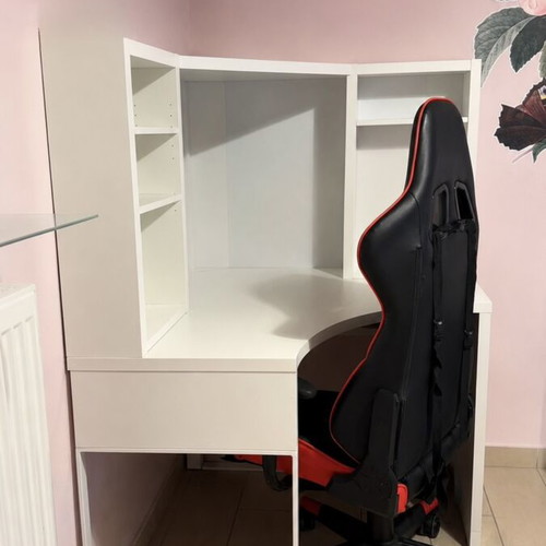 White corner desk with shelves used, modern and practical