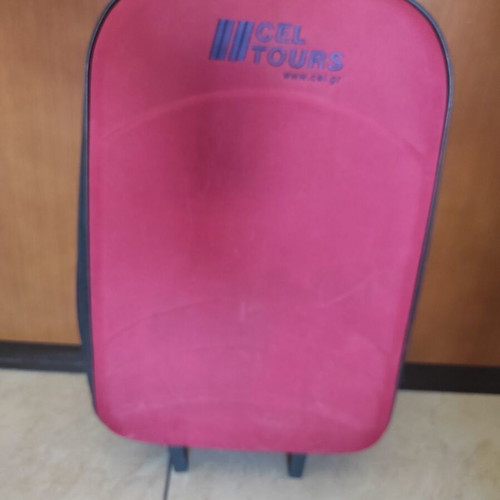Red fabric travel suitcase trolley carry-on