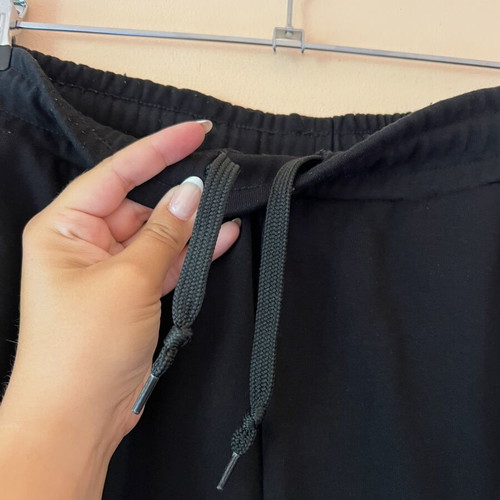 Black sports pants with white lace and elastic waist, like new, A-Style