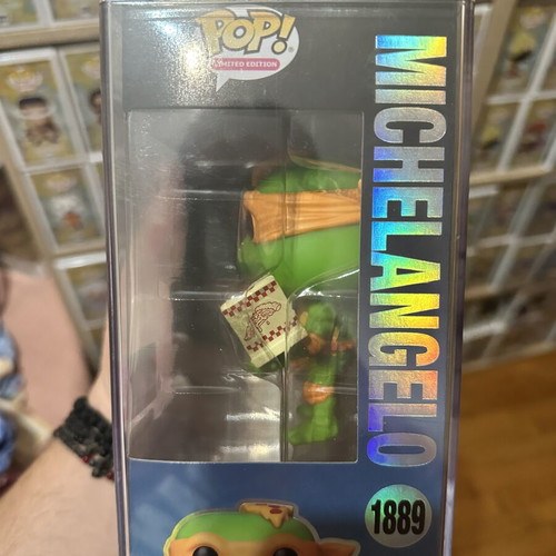 Funko Pop Michelangelo Teenage Mutant Ninja Turtles vinyl figure eating pizza