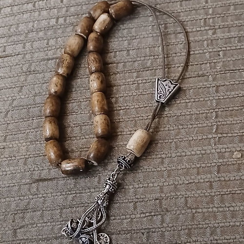 Worry beads made of bone used with oriental elements