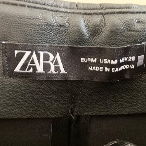 ZARA mini skirt made of faux leather used, size M, black