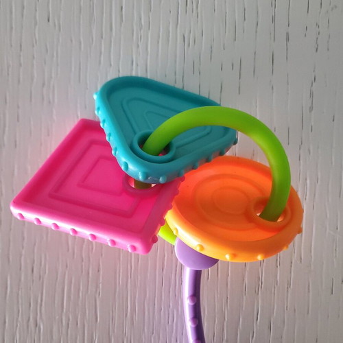 Fisher Price teething and chewing toy like new with multiple surfaces
