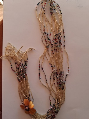 Beaded necklace with decorative flower, almost unused, yellow-gold shades, 50 cm
