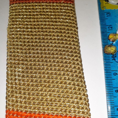 Handmade bookmark with dark orange, light gold and dark red colors