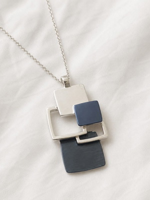 Geometric Blue necklace like new, modern design in silver and blue
