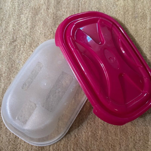 Oval food container used with fuchsia lid 20cm