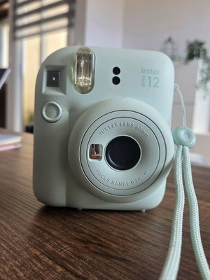 Instax Mini 12 Fujifilm Camera like new with case and film box