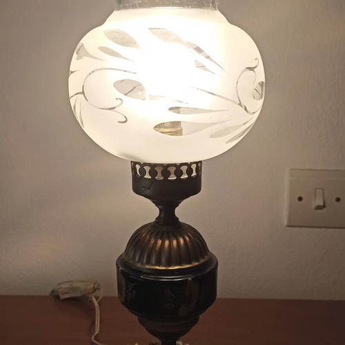 Vintage table lamp with glass shade and decorative metal base used