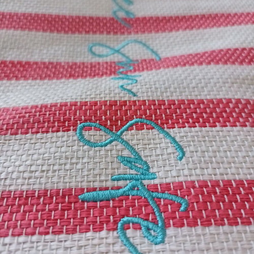 Summer toiletry bag used striped with embroidered Bee Sun Safe phrase