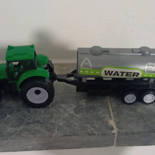 Toy tractor used, plastic, like new in box