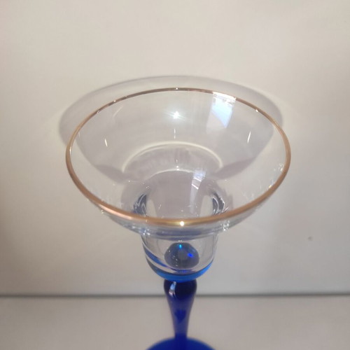 Glass candlestick like new with gilded details