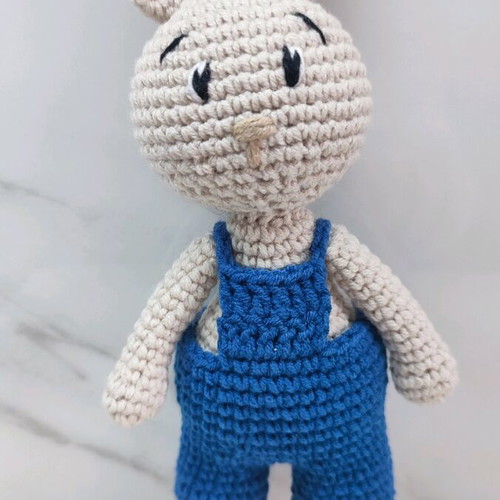 Amigurumi knitted bunny new with dark blue overalls
