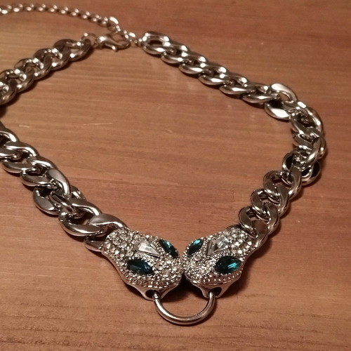 Choker necklace solid with snakes in like new condition