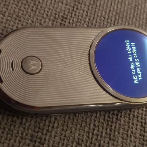 Motorola Aura used silver mobile phone