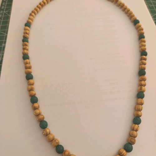 Long handmade necklace new with lava stones and wooden beads