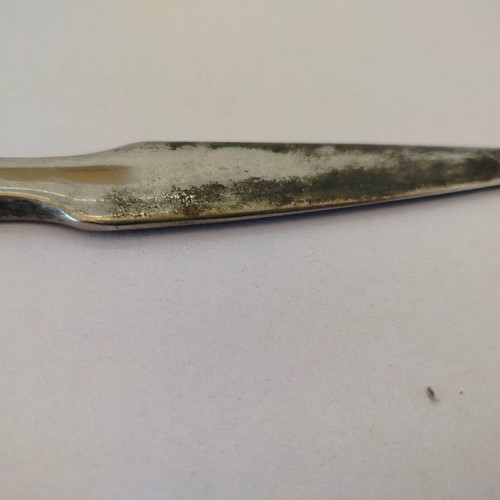 Vintage metal letter opener with unique handle
