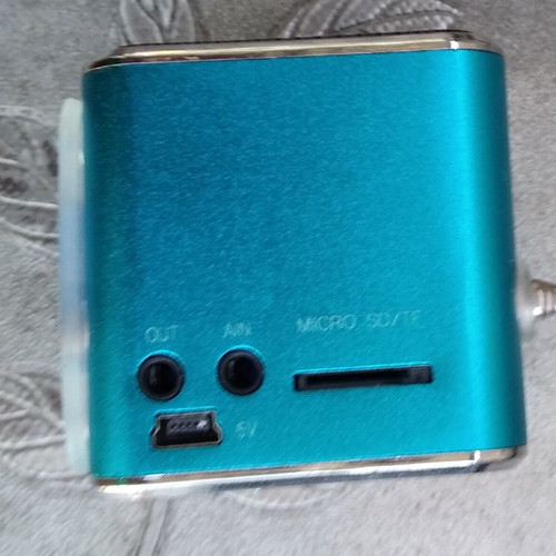 Miniature speaker and FM radio with rechargeable battery