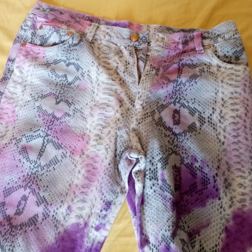 Y2K flare pants with snake print and purple tie dye details like new