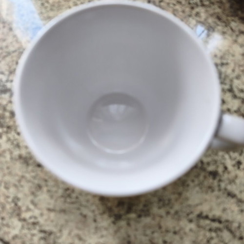 Butlers mug with knitted cover, like new, white and grey