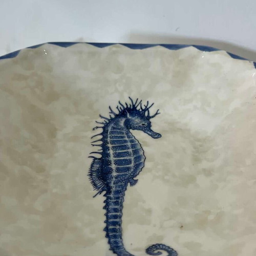Vintage Italian ceramic serving bowl with seahorse design and marble effect used