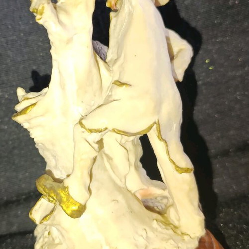 Vintage decorative figurine with children, used