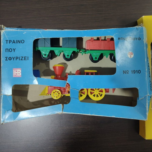 Train that whistles Vasileiadis used, missing two doors, one broken wagon