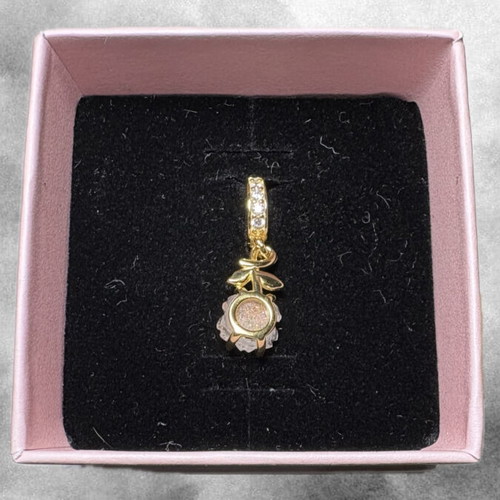 Golden Blossom Charm like new, gold and silver