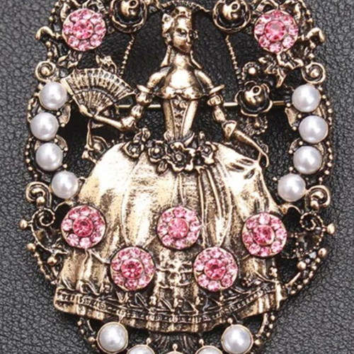 Vintage brooch with pink and white decorative stones like new