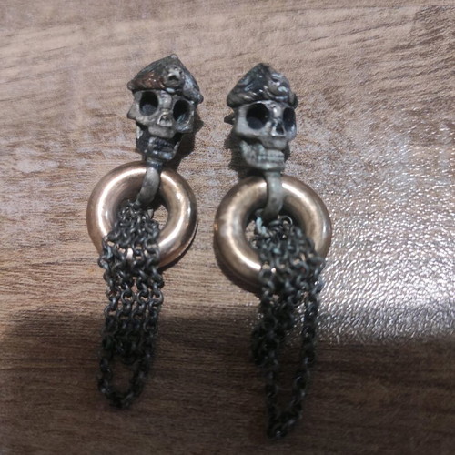 Earrings used with skull design