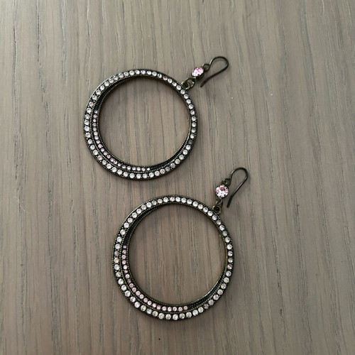 Earrings used with pink rhinestones and dark-colored clasp