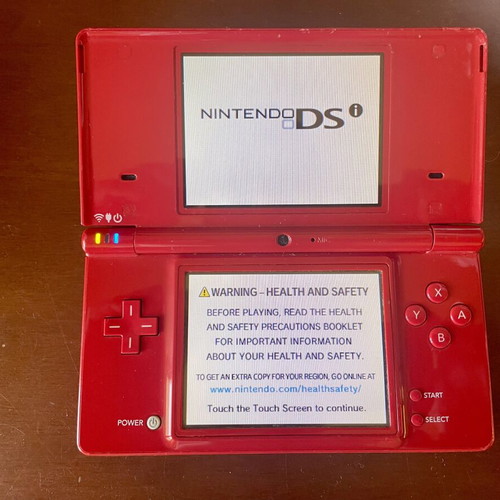 Nintendo DSi console with charger, stylus and memory card