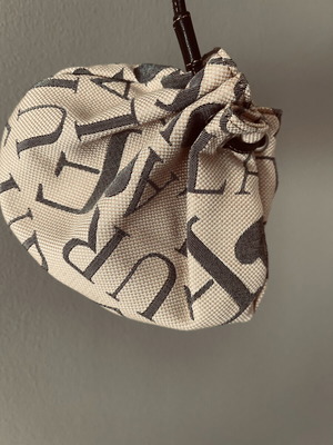 Furla pouch bag like new, monogram fabric and leather