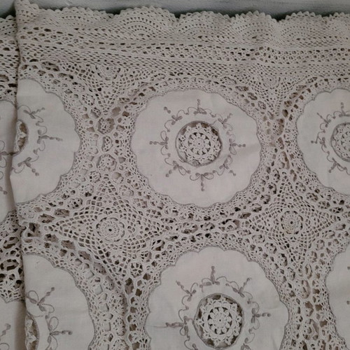 Embroidered tablecloth with lace and handmade crochet