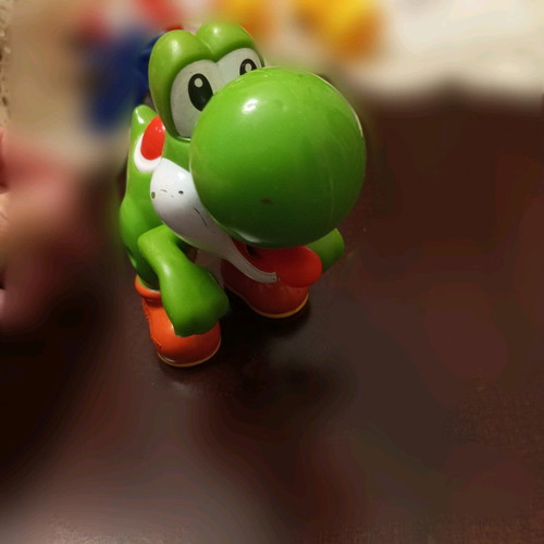 Children's toy like new with red button and tongue