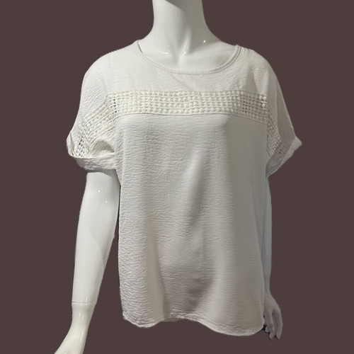 Blouse XL used, light beige with embossed chest design and cuff revers